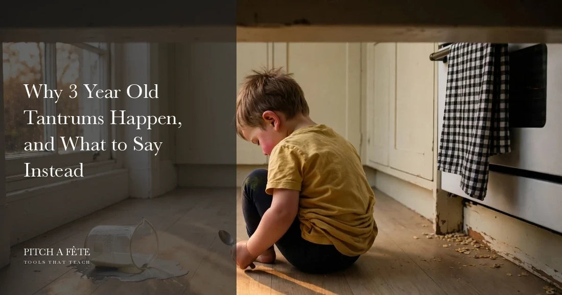 A three year old sitting on a kitchen floor beside a tipped jug of milk during one of the common 3 year old tantrums
