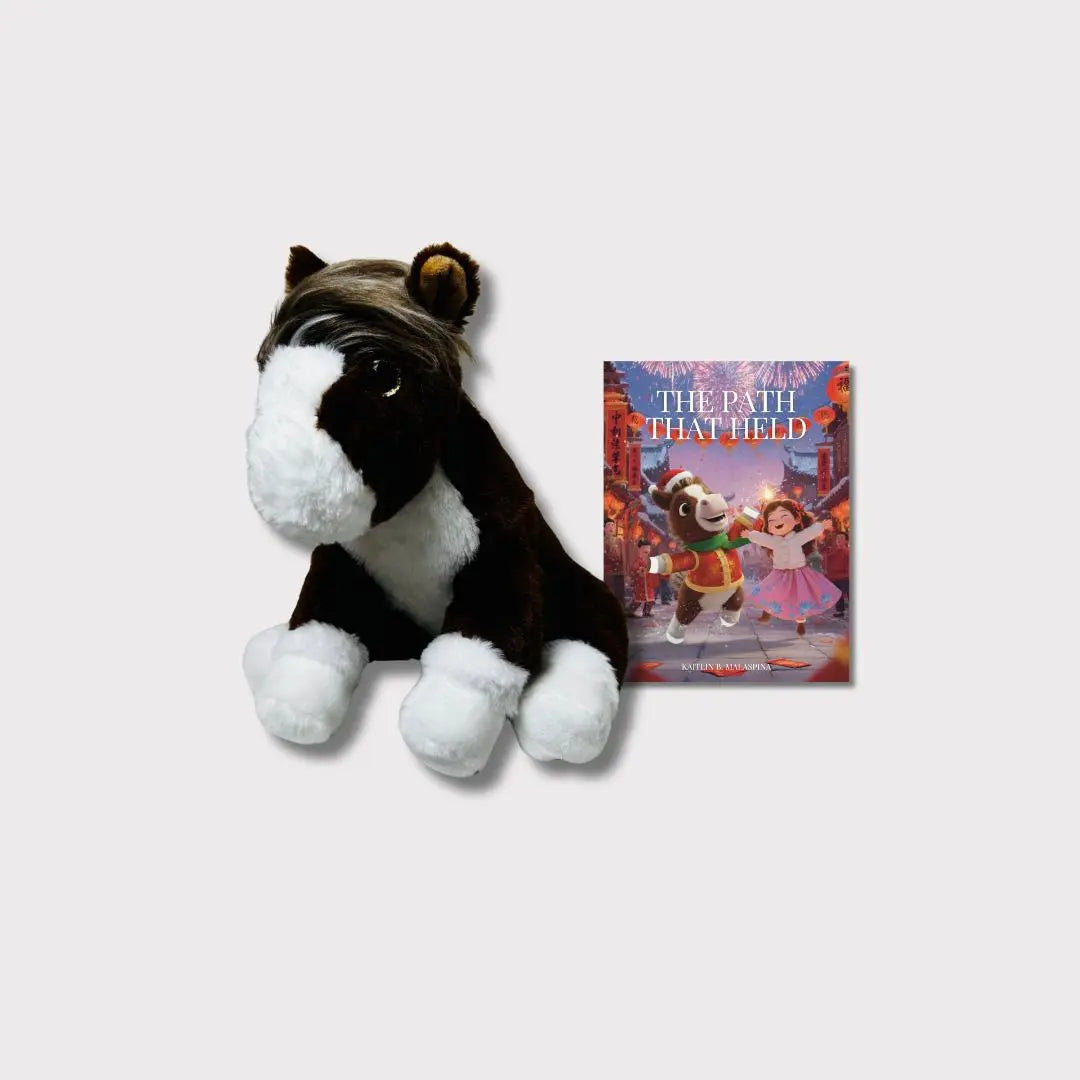 Full StoryTime Toolkit contents including plush, book, certificate, and heart.